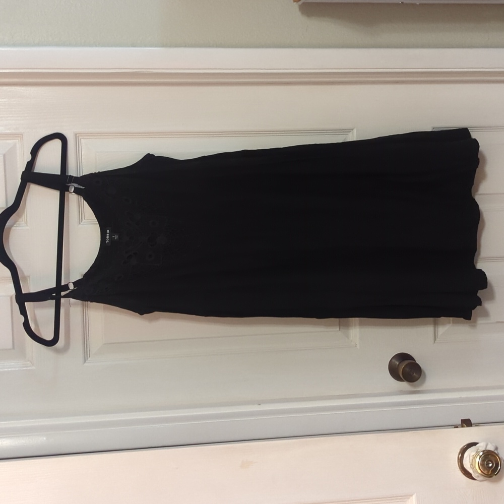 Flowy black dress with crochet detail